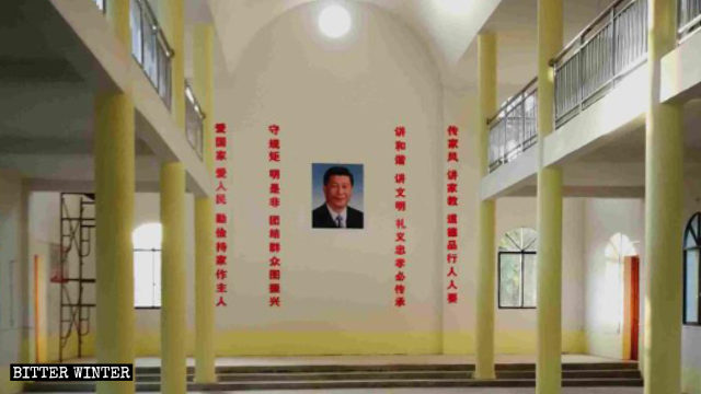 The-portrait-of-Xi-Jinping-hangs-at-the-center